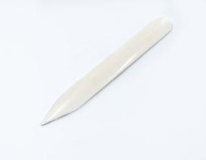 Костяная гладилка для кожи