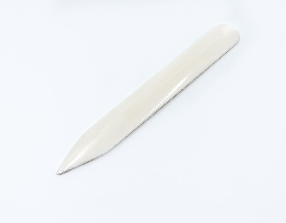 Костяная гладилка для кожи